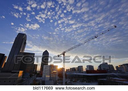 Industrial Crane within City Skyline View Large Photo Image Stock Photo - Industrial Crane within City Skyline. Fotosearch