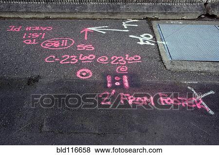 Information Painted on a Road for Road Crews View Large Photo Image Stock Photo - Information Painted on a Road for Road Crews. Fotosearch