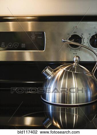 Stock Image - Kettle on a Stove Range. Fotosearch