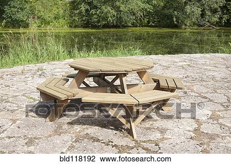 Stock Image - Lakeside Picnic Table. Fotosearch