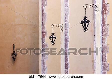Stock Photograph - Lanterns on Wall. Fotosearch