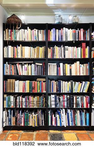 Large book case, containing a private collection of antique books and novels in an old house View Large Photo Image Stock Image - Large book case, containing a private collection of antique books and novels in an old house. Fotosearch