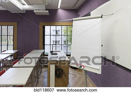 Lecture rooms with tables and chairs View Large Photo Image Stock Photo - Lecture rooms with tables and chairs. Fotosearch