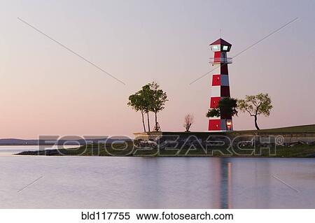 Stock Photography - Lighthouse on a Beach. Fotosearch