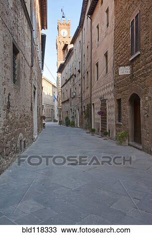 Stock Image - Medieval Street and Clock Tower. Fotosearch
