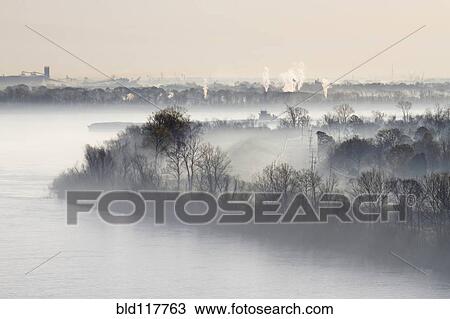 Stock Image - Mist Shrouded River. Fotosearch