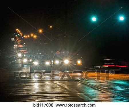 Night Traffic on a Wet Street View Large Photo Image Stock Photo - Night Traffic on a Wet Street. Fotosearch
