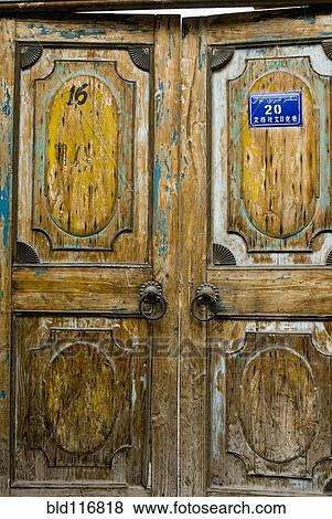 Stock Photo - Old Double Wooden Doors. Fotosearch
