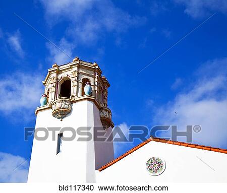 Stock Image - Old World Building Under a Blue Sky. Fotosearch