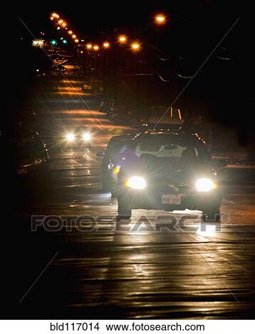 Oncoming Traffic at Night View Large Photo Image Picture - Oncoming Traffic at Night. Fotosearch