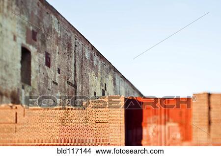 Partial Brick Wall and Doors View Large Photo Image Picture - Partial Brick Wall and Doors. Fotosearch