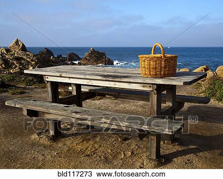 Picnic Basket on Wooden Picnic Table View Large Photo Image Stock Image - Picnic Basket on Wooden Picnic Table. Fotosearch