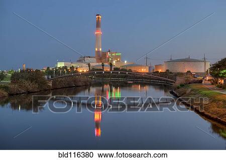 Stock Image - Power Station Near River. Fotosearch