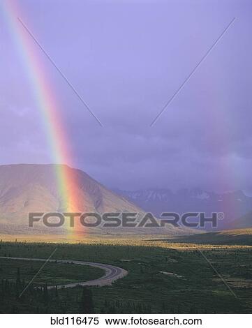 Stock Photography - Rainbow against the Alaska Range in Denali National Park, Alaska. Fotosearch
