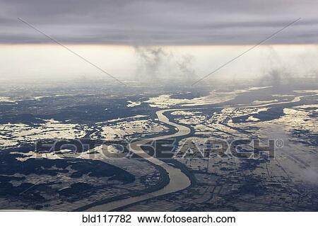 River Running through a Flooded Countryside View Large Photo Image Stock Image - River Running through a Flooded Countryside. Fotosearch
