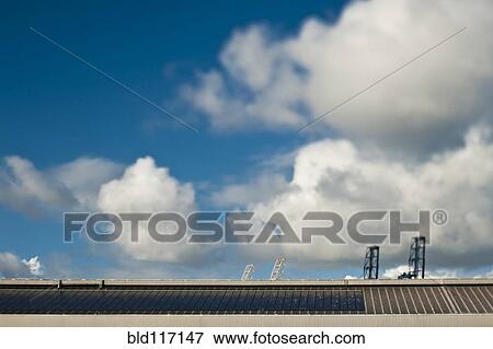 Roof Line and Cranes At a Seaport View Large Photo Image Stock Photo - Roof Line and Cranes At a Seaport. Fotosearch