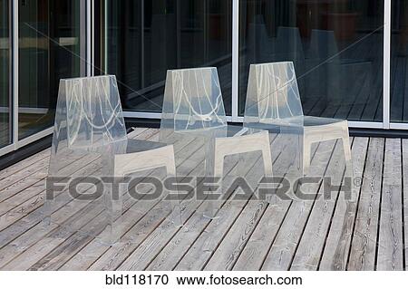 Row of Modern Translucent Chairs View Large Photo Image Stock Image - Row of Modern Translucent Chairs. Fotosearch