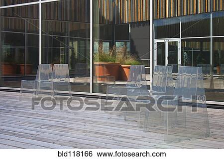 Row of Modern Translucent Chairs View Large Photo Image Stock Photograph - Row of Modern Translucent Chairs. Fotosearch