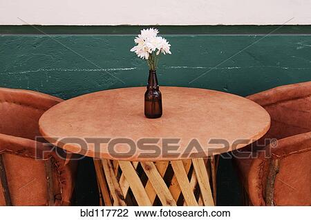 Stock Image - Rustic Table and Chairs. Fotosearch