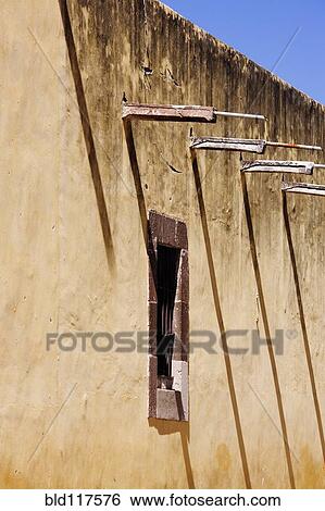 Stock Photograph - Shadows on Old World Building. Fotosearch