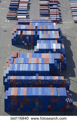 Stock Image - Shipping Containers To Be Loaded Onto Semi Trucks. Fotosearch