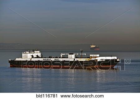 Shipping Vessel Floating in Water View Large Photo Image Stock Image - Shipping Vessel Floating in Water. Fotosearch