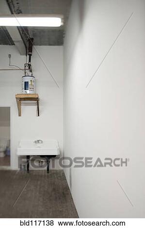 Stock Photo - Sink in Warehouse Washroom. Fotosearch
