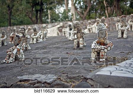 Small Figurines in Rock Garden View Large Photo Image Stock Photo - Small Figurines in Rock Garden. Fotosearch