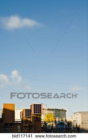 Stock Image - Solar Panels at an Oil Refinery. Fotosearch