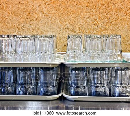 Stock Image - Stacked Glasses in a Cafeteria. Fotosearch