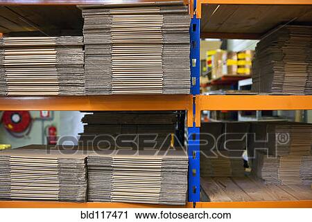 Stacks of folded cardboard boxes View Large Photo Image Stock Image - Stacks of folded cardboard boxes . Fotosearch