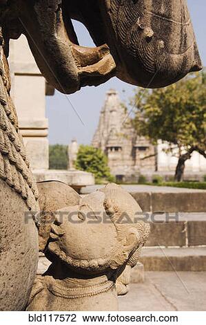 Stock Image - Statues in City Scene. Fotosearch