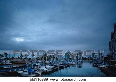 Stormy Skies Over Boat Harbor at Night, Honolulu, Hawaii View Large Photo Image Stock Photo - Stormy Skies Over Boat Harbor at Night, Honolulu, Hawaii. Fotosearch