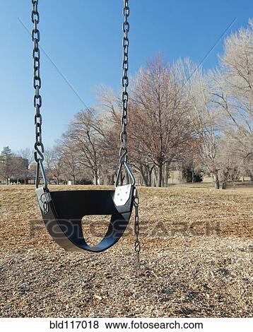Swing Set on a Grass Field View Large Photo Image Stock Photo - Swing Set on a Grass Field. Fotosearch