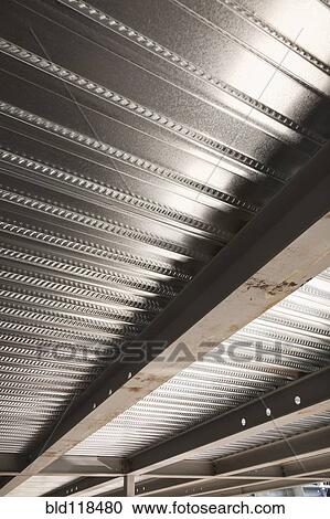 The ceiling of a commercial construction View Large Photo Image Stock Image - The ceiling of a commercial construction. Fotosearch