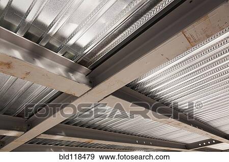 The ceiling of a commercial construction View Large Photo Image Stock Photo - The ceiling of a commercial construction. Fotosearch