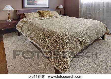 The master bedroom in a house View Large Photo Image Stock Image - The master bedroom in a house. Fotosearch