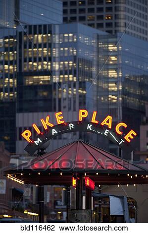 Stock Image - The neon sign of "Pike Place Market" in downtown Seattle, Washington. Fotosearch