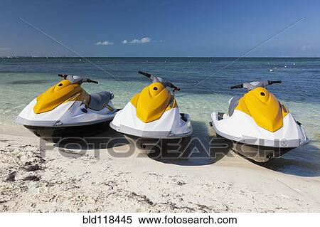 Three jet skis on the beach at Cancun View Large Photo Image Stock Photography - Three jet skis on the beach at Cancun. Fotosearch