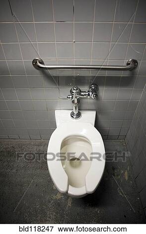 Toilet Bowl in a Tiled Restroom View Large Photo Image Stock Photo - Toilet Bowl in a Tiled Restroom. Fotosearch