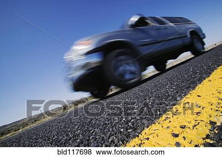 Truck Driving on Road View Large Photo Image Stock Photo - Truck Driving on Road. Fotosearch