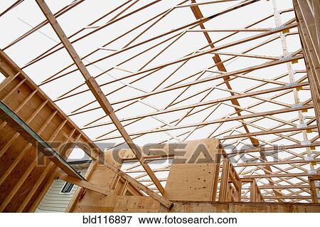 Trusses in Home Under Construction View Large Photo Image Stock Photo - Trusses in Home Under Construction. Fotosearch
