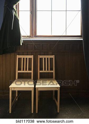 Two Empty Chairs Beneath a Window View Large Photo Image Stock Photo - Two Empty Chairs Beneath a Window. Fotosearch
