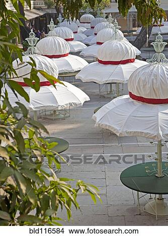 Picture - Umbrella Tables in the Jag Mandir Palace. Fotosearch
