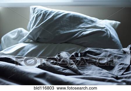 Stock Image - Unmade Bed. Fotosearch