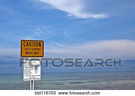 Warning Signs at the Beach View Large Photo Image Stock Image - Warning Signs at the Beach. Fotosearch