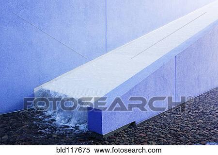 Stock Photography - Water Running Down Ramp into Pool. Fotosearch