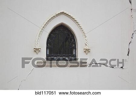 Stock Image - Window in a Cracked Building Wall. Fotosearch