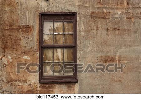 Stock Image - Window in Stucco Wall. Fotosearch