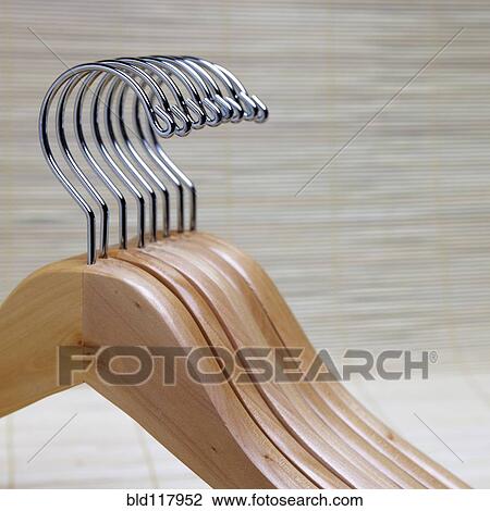 Stock Image - Wooden Clothes Hangers. Fotosearch